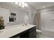 Bright bathroom with a large mirror, spacious countertop, and a shower-tub combination at 1722 Winfield Way, Charleston, SC 29414