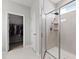 Modern bathroom featuring a glass-enclosed shower with tile surround and a separate walk-in closet at 1722 Winfield Way, Charleston, SC 29414