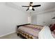 Bedroom with ceiling fan, bed, closet and ensuite bath at 1722 Winfield Way, Charleston, SC 29414