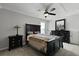 Bedroom with a dark wood frame bed, ceiling fan, window with natural light and full dresser at 1722 Winfield Way, Charleston, SC 29414