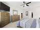 Relaxing bedroom with large dresser set, ceiling fan, and plush carpet, creating a peaceful retreat at 1722 Winfield Way, Charleston, SC 29414