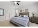 Comfortable bedroom with a large bed, ceiling fan and two nightstands, creating a serene atmosphere at 1722 Winfield Way, Charleston, SC 29414