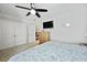 Bedroom with a ceiling fan, dresser, and a view into the hallway at 1722 Winfield Way, Charleston, SC 29414