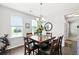 Inviting dining room with dark wood table, chairs, and modern chandelier at 1722 Winfield Way, Charleston, SC 29414