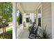 Welcoming porch with rocking chairs, offering a relaxing outdoor space at 1722 Winfield Way, Charleston, SC 29414