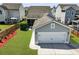 An aerial view of the two-car garage, backyard and patio at 1722 Winfield Way, Charleston, SC 29414