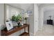 Cozy hallway featuring a decorative table with mirror, floral arrangement, and stylish accents at 1722 Winfield Way, Charleston, SC 29414