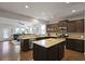 Open kitchen with a central island, stainless steel appliances, and granite countertops at 1722 Winfield Way, Charleston, SC 29414