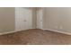 Neutral bedroom with plush carpet, a closet, and a single door, all surrounded by light, painted walls at 1730 Refuge Dr, Ladson, SC 29456