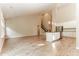 Bright and airy living area with hardwood floors, high ceilings, and a modern kitchen island at 1730 Refuge Dr, Ladson, SC 29456