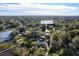 Expansive aerial view of a charming home nestled among lush trees near the waterway in a sought-after location at 1834 Cornish Ave, Charleston, SC 29412