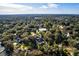 An impressive aerial view displays the neighborhood's tree coverage and the home's proximity to the water at 1834 Cornish Ave, Charleston, SC 29412