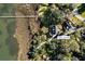Aerial view showing property's proximity to the marsh, including a dock, and its location at 1834 Cornish at 1834 Cornish Ave, Charleston, SC 29412