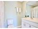 Full bathroom with a toilet, modern vanity, mirror, and shower-tub combination with white paint at 1834 Cornish Ave, Charleston, SC 29412
