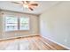 Bright bedroom with hardwood floors, neutral walls, and ample natural light at 1834 Cornish Ave, Charleston, SC 29412