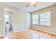 Inviting bedroom features hardwood floors, closet and an ensuite bathroom at 1834 Cornish Ave, Charleston, SC 29412
