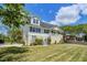Attractive two-story home boasting a well-manicured lawn and an inviting side entrance at 1834 Cornish Ave, Charleston, SC 29412