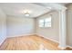 Cozy living room with hardwood floors, neutral walls, and an abundance of natural light at 1834 Cornish Ave, Charleston, SC 29412