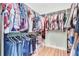 A spacious walk-in closet with custom shelving and ample hanging space keeps your wardrobe organized and accessible at 1834 Cornish Ave, Charleston, SC 29412