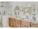 Bright and modern bathroom featuring a double vanity and a glass shower at 19 Ponce De Leon Ave, Charleston, SC 29407