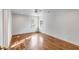 Sun-filled bedroom featuring hardwood floors and large windows with a view at 19 Ponce De Leon Ave, Charleston, SC 29407