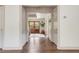 Inviting foyer with hardwood floors and double doors leading to the outside at 19 Ponce De Leon Ave, Charleston, SC 29407