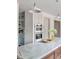 Modern kitchen with marble countertops, a built-in oven, and stylish pendant lighting at 19 Ponce De Leon Ave, Charleston, SC 29407