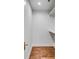 Walk-in closet with wooden floors and white shelving at 19 Ponce De Leon Ave, Charleston, SC 29407