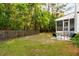 Fenced backyard featuring a patio area and lush green space for outdoor enjoyment at 1971 N Smokerise Way, Mount Pleasant, SC 29466