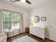 Bedroom with a white dresser and a window view at 1971 N Smokerise Way, Mount Pleasant, SC 29466