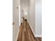 Hallway with wood-look flooring and natural light at 1971 N Smokerise Way, Mount Pleasant, SC 29466