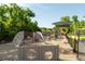 Outdoor playground with climbing features, slides, and shaded benches, offering a delightful space for children to play at 1971 N Smokerise Way, Mount Pleasant, SC 29466