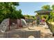 Playground with climbing structures and slide, provides a fun and safe environment for children to play and explore at 1971 N Smokerise Way, Mount Pleasant, SC 29466