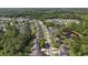 Stunning aerial view of a well-planned community with lush trees and picturesque ponds at 2016 Elvington Rd, Johns Island, SC 29455