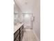 Neutral bathroom features vanity, shower-bath combo, and tile floors at 2016 Elvington Rd, Johns Island, SC 29455