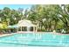 Large outdoor pool with ample seating and a covered pavilion for residents to enjoy at 2016 Elvington Rd, Johns Island, SC 29455