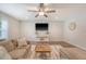 Comfortable living room featuring a plush sectional sofa and a modern ceiling fan at 2016 Elvington Rd, Johns Island, SC 29455