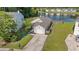 Charming home with a one-car garage and a tranquil pond view, enhanced by lush green lawns at 203 Eagle Ridge Rd, Summerville, SC 29485