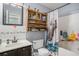 Bathroom featuring a vanity, toilet, and bathtub with shower showcasing a unique shower curtain at 203 Eagle Ridge Rd, Summerville, SC 29485