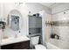 Bathroom showcasing a vanity, toilet, tub, and shower with tiled walls and modern fixtures at 203 Eagle Ridge Rd, Summerville, SC 29485