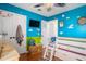 bedroom featuring colorful walls, modern lighting, hardwood floors and white doors at 203 Eagle Ridge Rd, Summerville, SC 29485