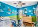 Colorful bedroom featuring a creative color scheme, decor and hardwood floors at 203 Eagle Ridge Rd, Summerville, SC 29485
