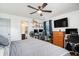 Bedroom featuring a ceiling fan, wood floors, and natural light from a window at 203 Eagle Ridge Rd, Summerville, SC 29485