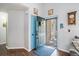 Bright foyer featuring hardwood floors, light blue trim, and an inviting atmosphere at 203 Eagle Ridge Rd, Summerville, SC 29485