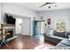Comfortable living room with a fireplace, wood floors, and open access to the foyer at 203 Eagle Ridge Rd, Summerville, SC 29485