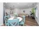 Open-concept living area with a modern kitchen, dining space, and a cozy living room at 203 O'Malley Dr, Summerville, SC 29483