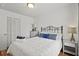 Well-lit bedroom with a cozy bed, matching nightstands, and a quaint decorative Eiffel tower at 2030 Coldspring Dr # 708, North Charleston, SC 29406