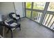 Comfortable seating area on the screened porch with a view of the community at 2030 Coldspring Dr # 708, North Charleston, SC 29406