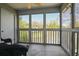 Relaxing screened porch with view of the community pond at 2030 Coldspring Dr # 708, North Charleston, SC 29406