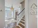 Hallway featuring hardwood floors, stairs and views of the front door and foyer at 219 Silverwood Ln, Summerville, SC 29485